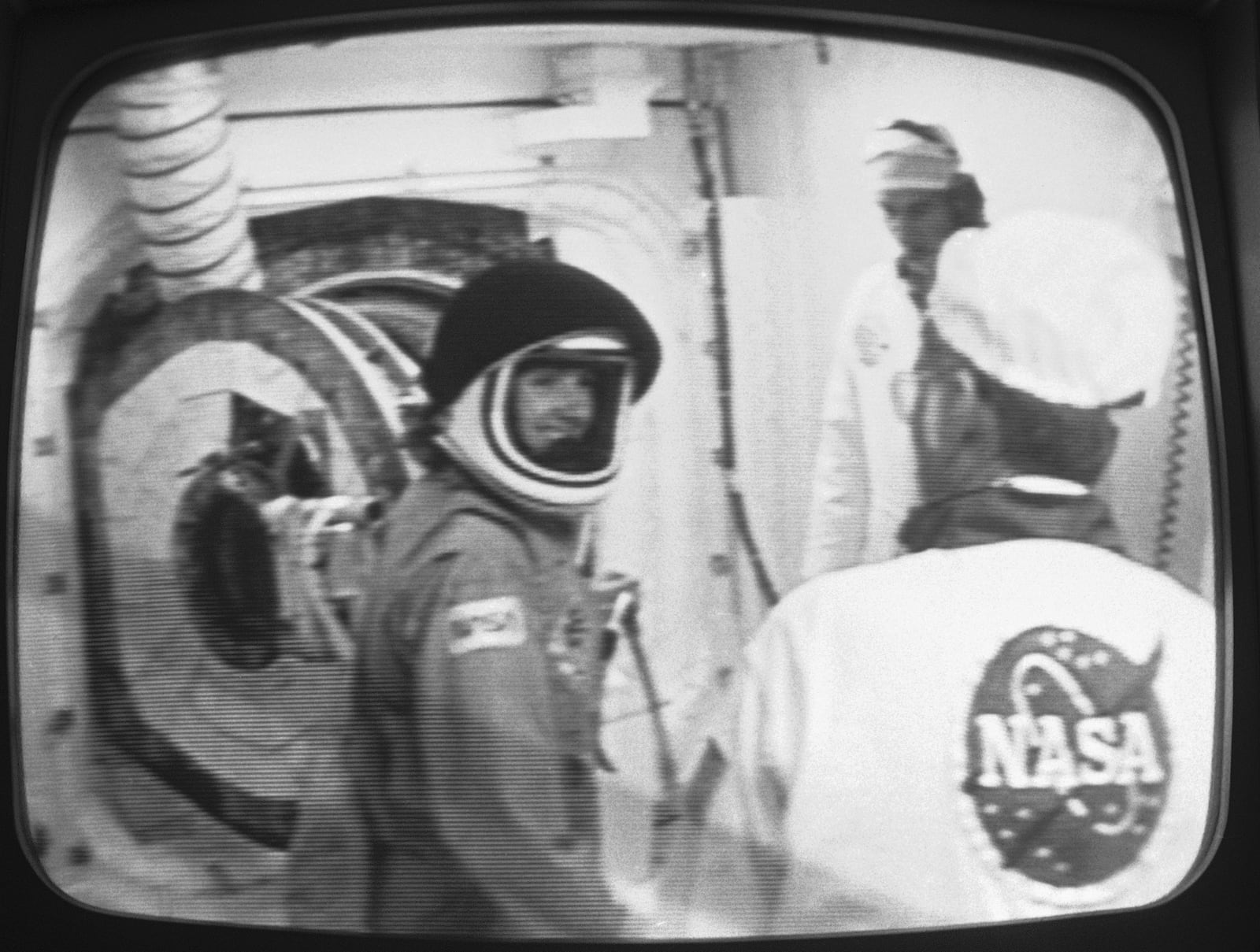 Christa McAuliffe, NASA's first teacher in space, smiles after she was suited up for her space flight, Jan. 27, 1986, at the Kennedy Space Center in Florida. (NASA via AP, File)