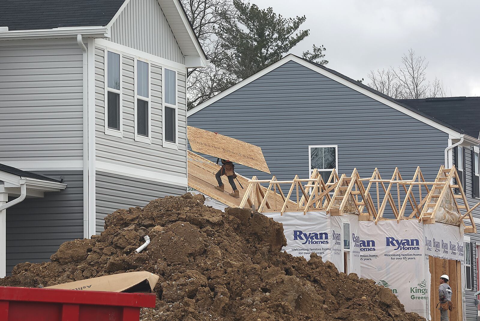 Houses are still being built Friday, April 8, 2022 in the Bridgewater development in Springfield Township. BILL LACKEY/STAFF