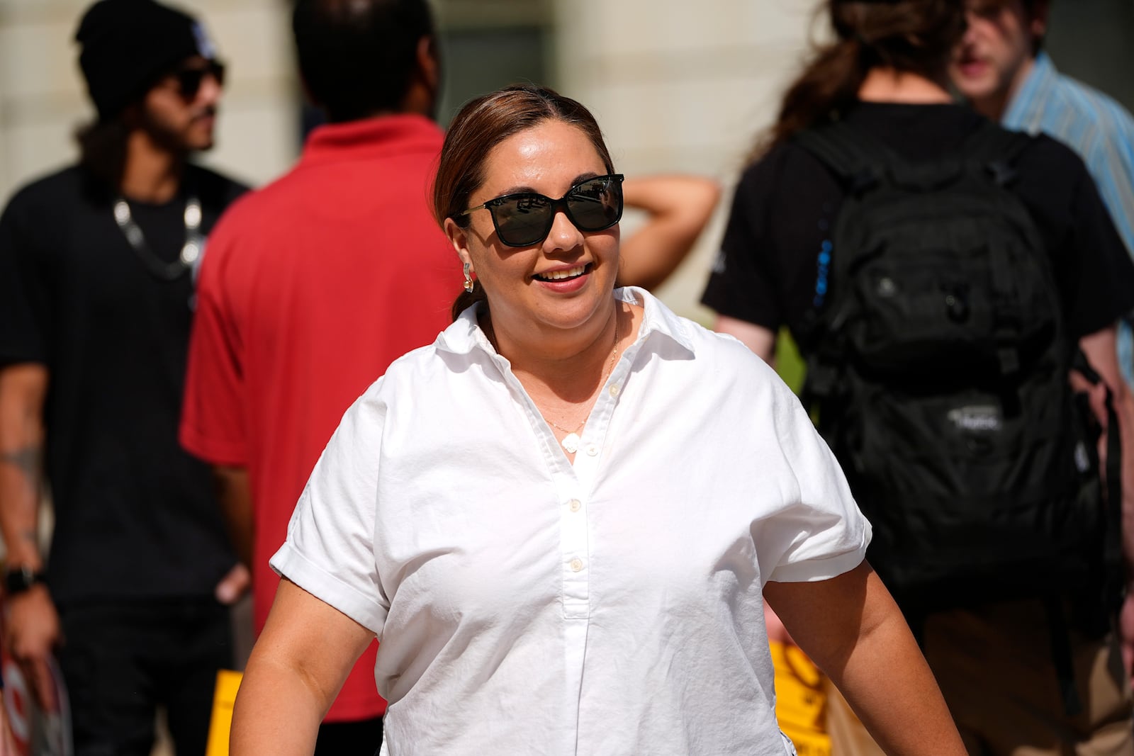 U.S. Rep. Yadira Caraveo, D-Colo., looks on during a protest by union members against the proposed merger of grocery store chains Kroger and Albertsons Monday, Sept. 30, 2024, outside the City/County Building while inside the courthouse the Colorado attorney's general office presented its case against the merger in the opening day of the trial in Denver. (AP Photo/David Zalubowski)