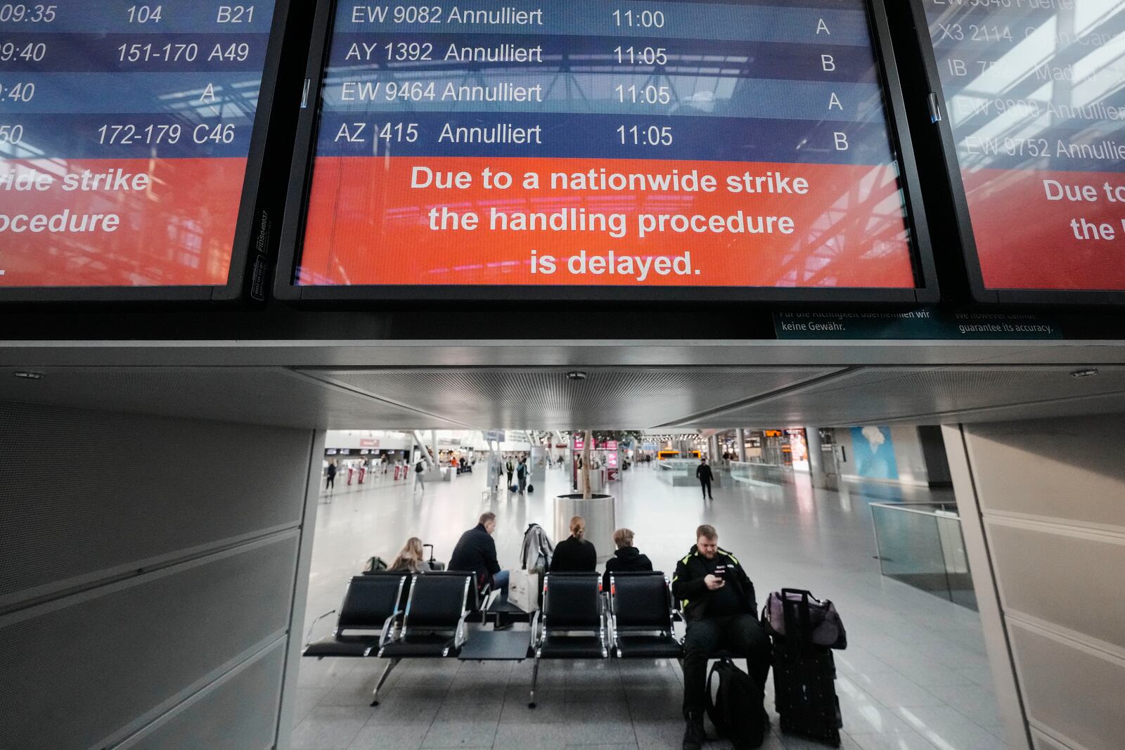 Flights are cancelled on a screen at the airport in Duesseldorf, Germany on Monday, March 10, 2025, when all major airports in Germany went on a warning strike. (AP Photo/Martin Meissner)