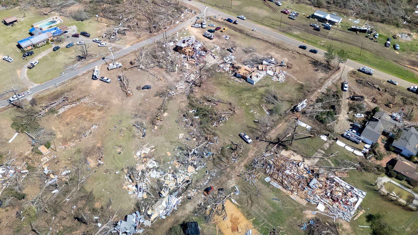 This image taken with a drone shows storm damage at the Lovelady Lane and Dallas County 63 interchange, Monday, March 17, 2025, in Plantersville, Ala, following deadly tornados that hit the area Saturday. (AP Photo/Vasha Hunt)