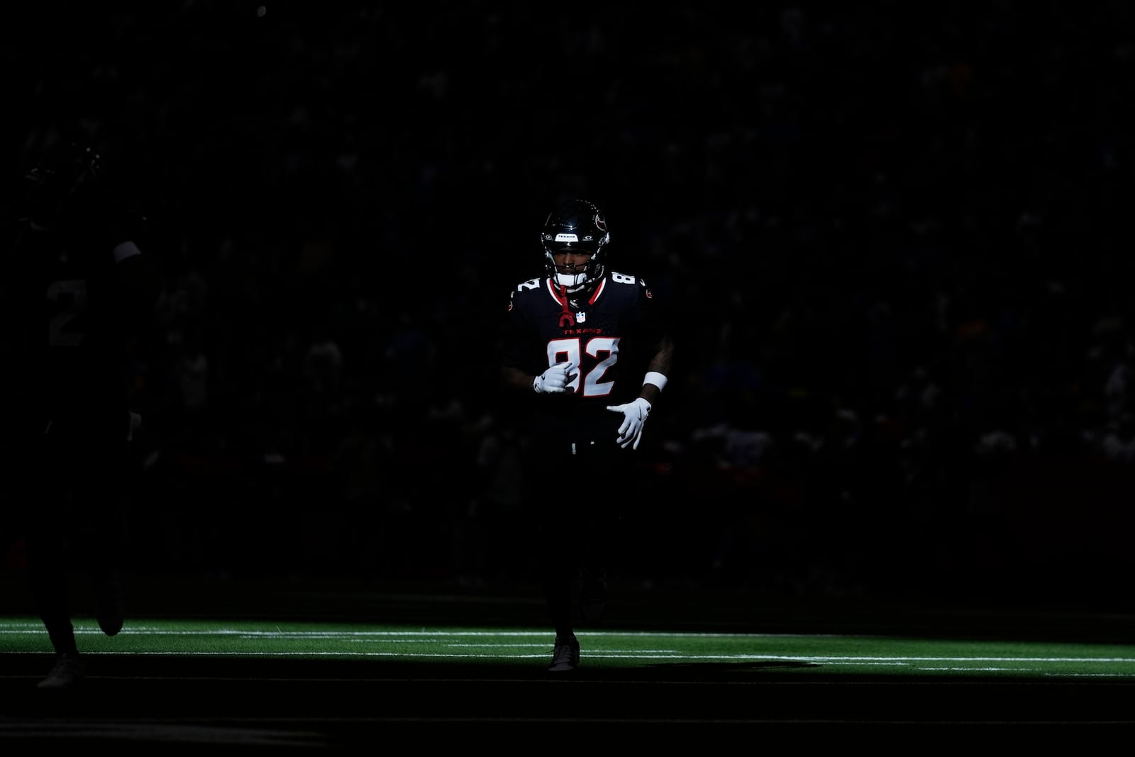 Houston Texans wide receiver Diontae Johnson is introduced before an NFL wild-card playoff football game against the Los Angeles Chargers Saturday, Jan. 11, 2025, in Houston. (AP Photo/Ashley Landis)