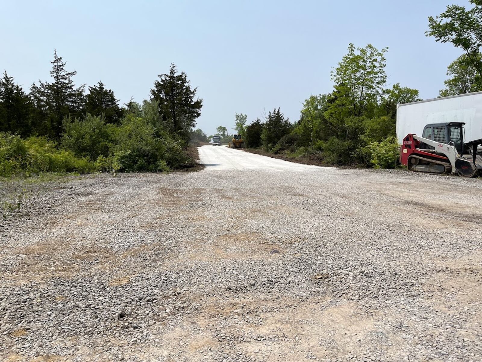 A new gravel road just east of the CenterPoint Energy Dayton Air Show's general admissions parking field off Northwoods Boulevard and North Dixie Drive. Air Show officials said Thursday motorists coming off Interstate 75 onto Northwoods this summer will be able to access general admissions parking much earlier, near where Engle Road meets Northwoods. THOMAS GNAU/STAFF