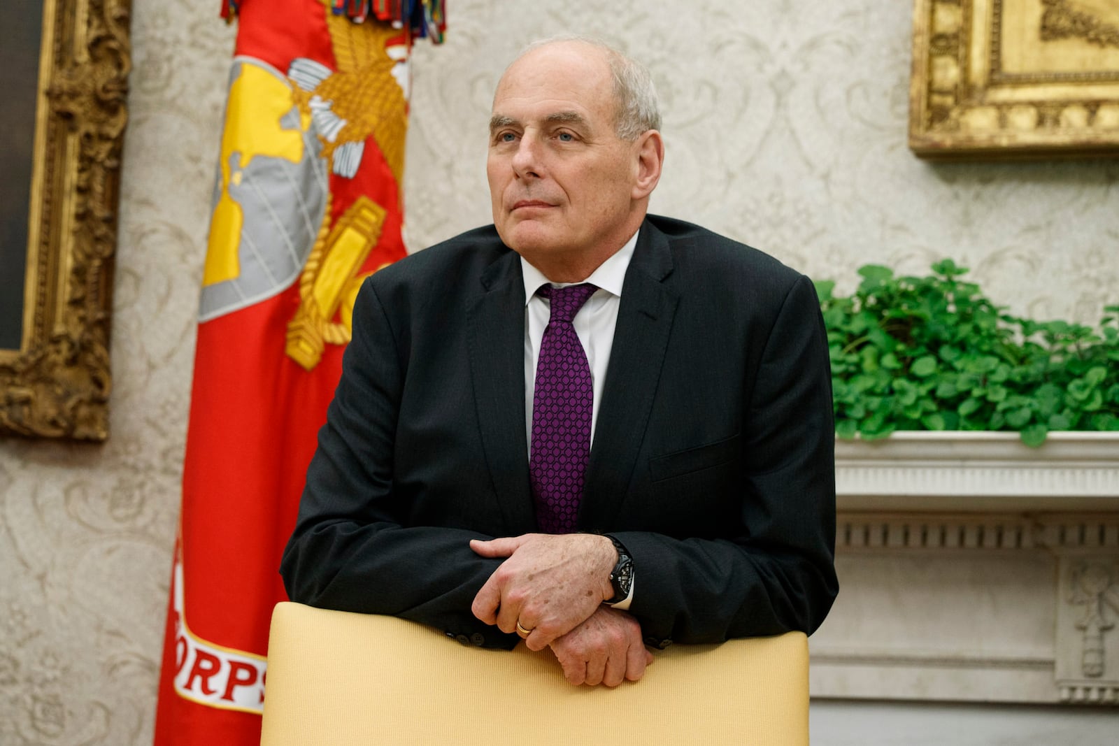 FILE - White House Chief of Staff John Kelly watches as President Donald Trump speaks in the Oval Office of the White House in Washington, Nov. 16, 2018. (AP Photo/Evan Vucci, File)