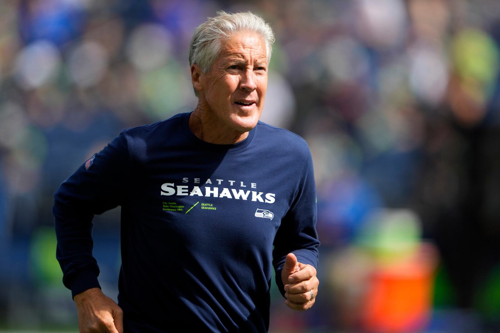 FILE - Seattle Seahawks head coach Pete Carroll jogs on the field before an NFL football game against the Los Angeles Rams, Sunday, Sept. 10, 2023, in Seattle. (AP Photo/Lindsey Wasson, File)