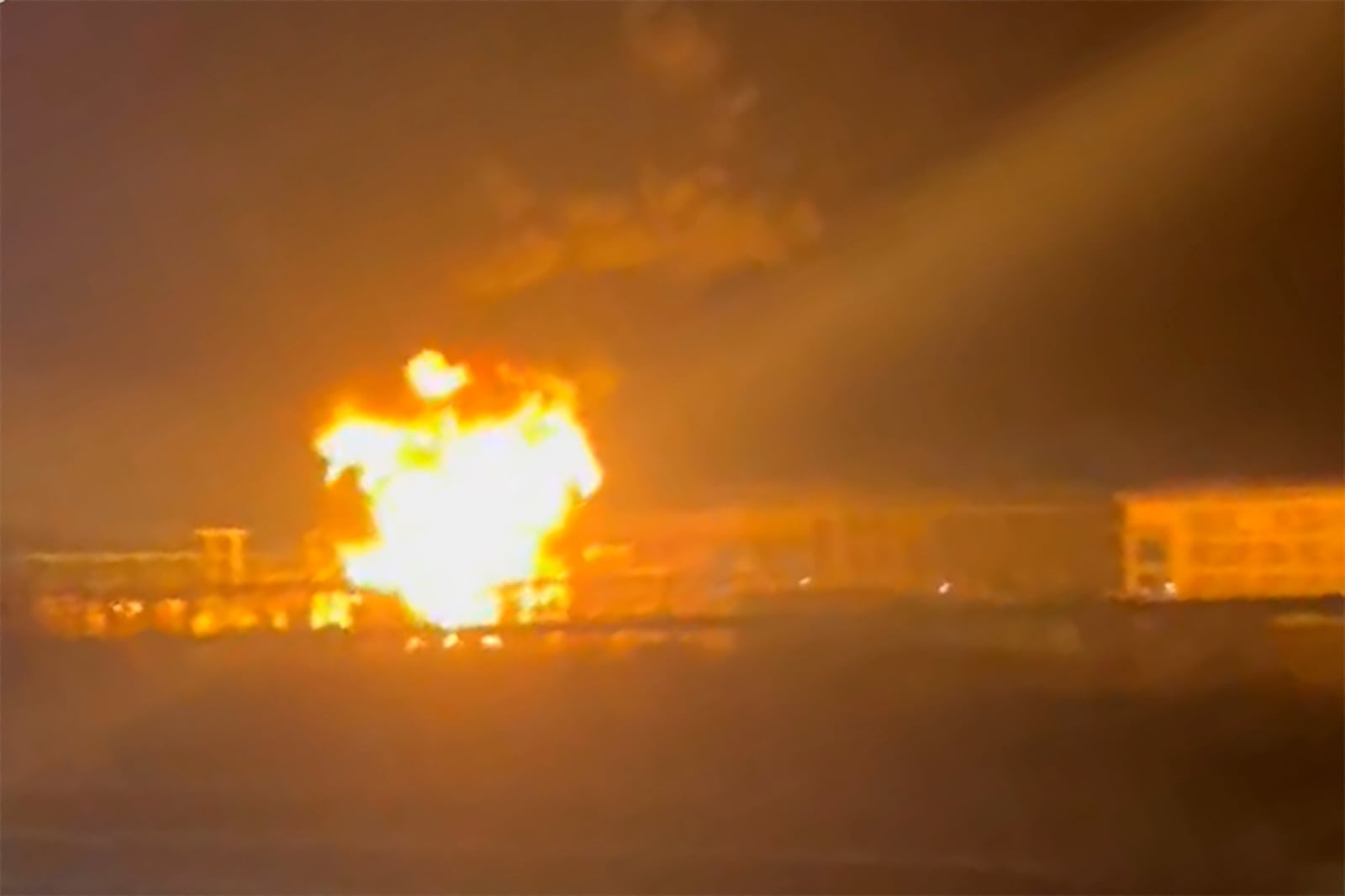 In this photo taken from video provided by Matthew Muirhead, a fire is seen at the North Hyde electrical substation near the Heathrow Airport in London, early Friday, March 21, 2025. (Matthew Muirhead via AP)