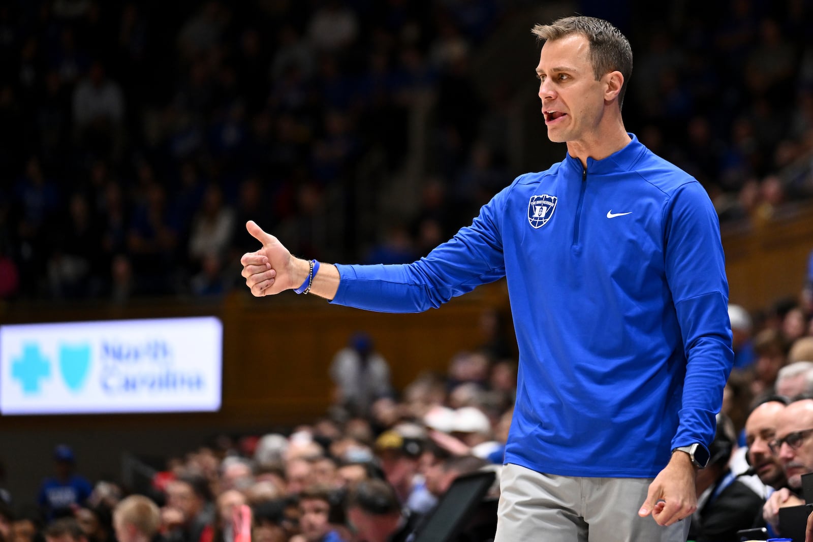 Duke head coach Jon Scheyer gives a thumbs up during the second half of an NCAA college basketball game against Incarnate Word on Tuesday, Dec. 10, 2024, in Durham, N.C. (AP Photo/Matt Kelley)