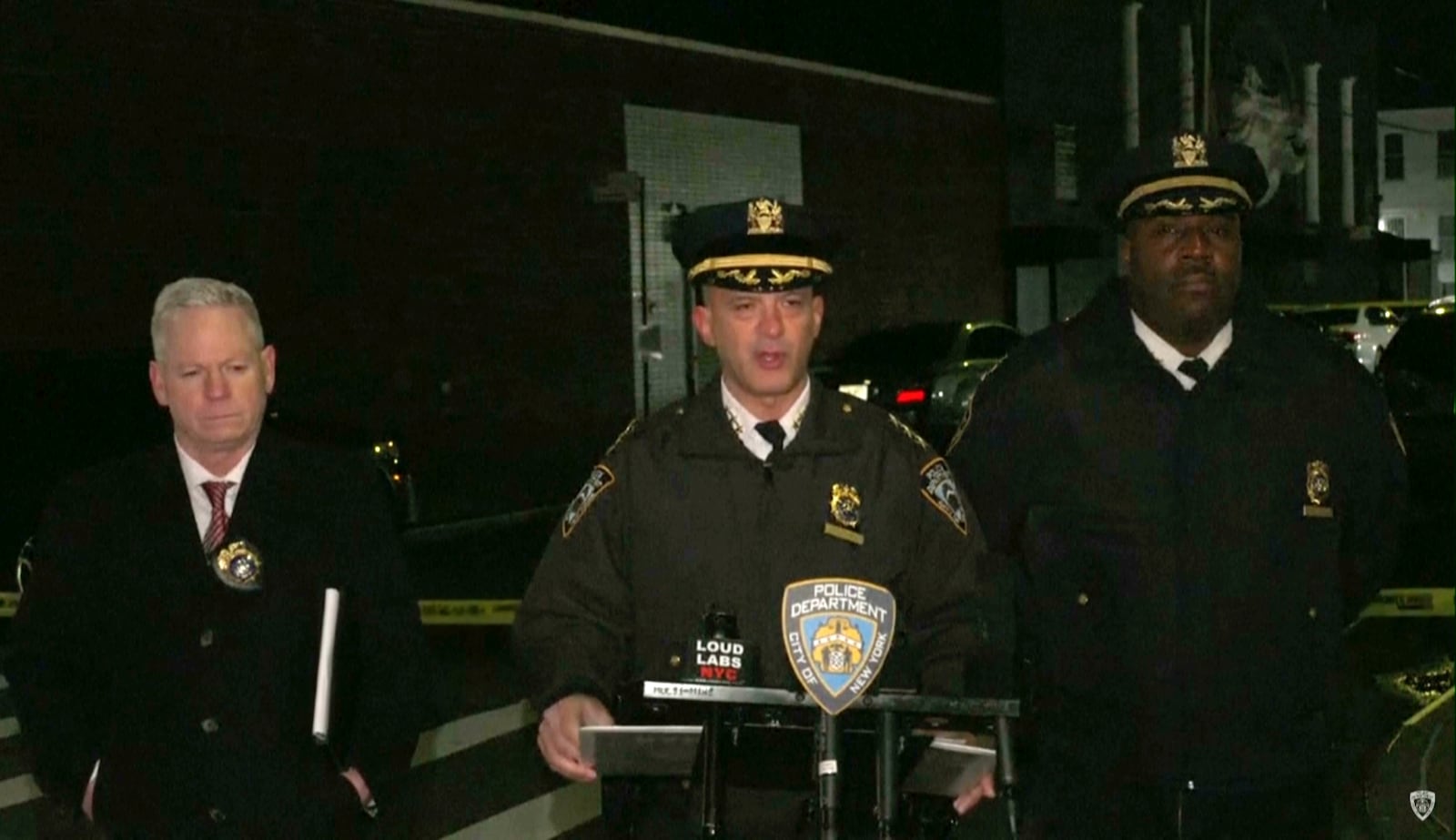 In this grab taken from a video provided by the New York Police Department, Chief of Patrol Philip Rivera, centre, speaks to the media during a press conference in New York, early Thursday, Jan. 2, 2025, the day after a shooting outside a nightclub in Queens. (NYPD via AP)