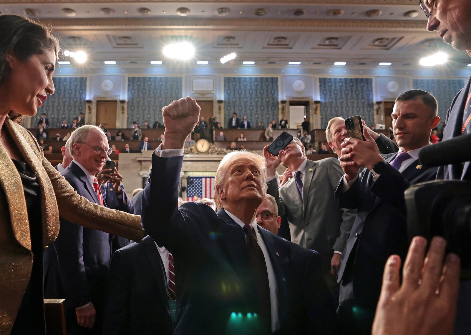 President Donald Trump leaves the chamber after addressing a joint session of Congress at the Capitol in Washington, Tuesday, March 4, 2025. (Win McNamee/Pool Photo via AP)