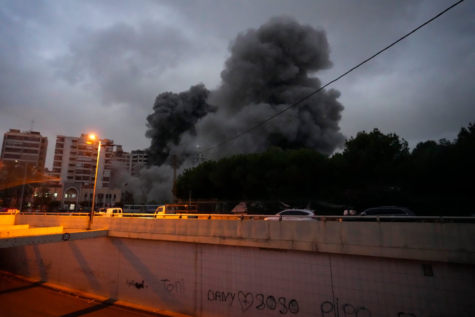 Smoke rise from an Israeli airstrike in Tayouneh, Beirut, Lebanon, Monday, Nov. 25, 2024. (AP Photo/Hassan Ammar)