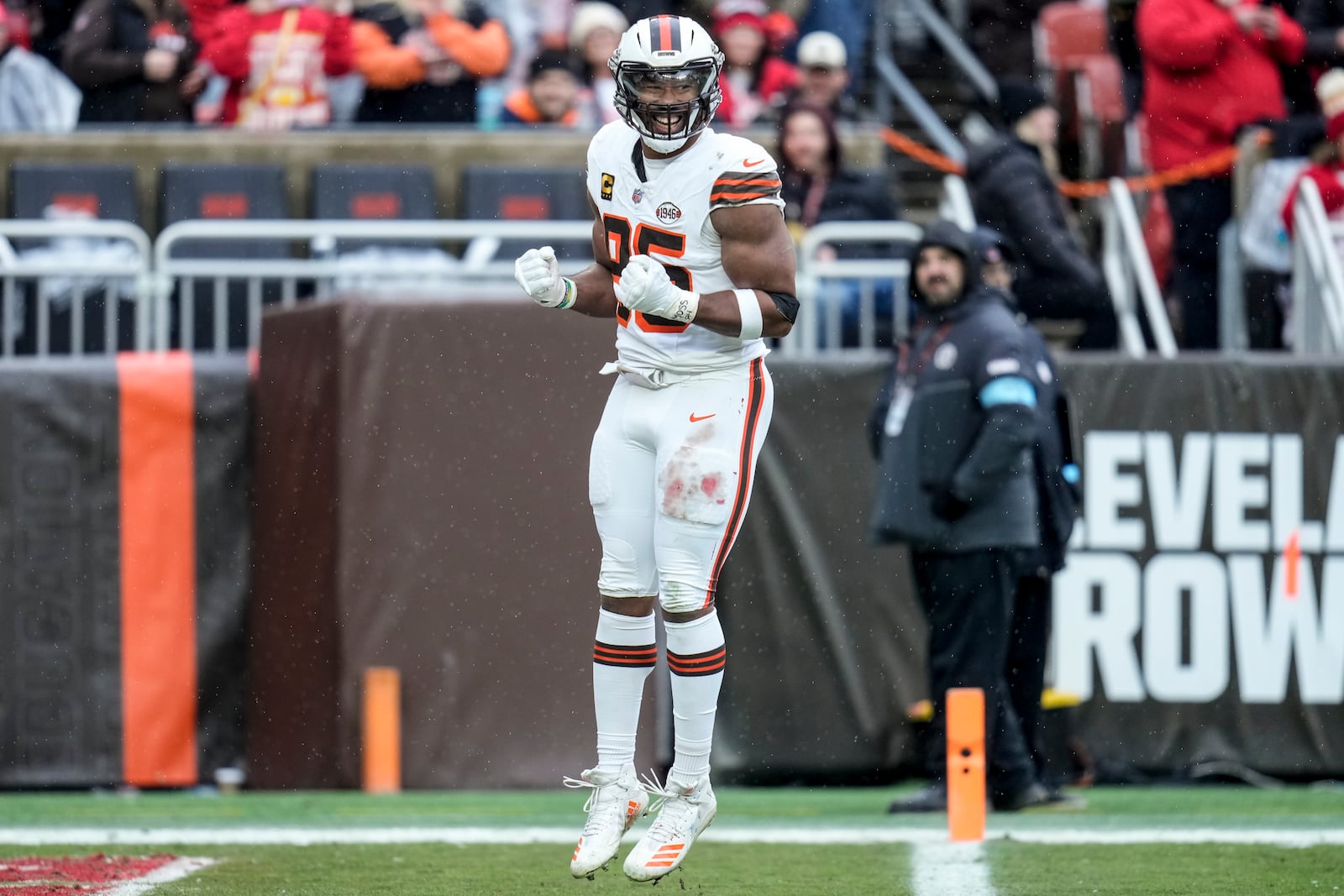 Cleveland Browns defensive end Myles Garrett (95) celebrates a defensive play against the Kansas City Chiefs during the first half of an NFL football game, Sunday, Dec. 15, 2024, in Cleveland. (AP Photo/Sue Ogrocki)