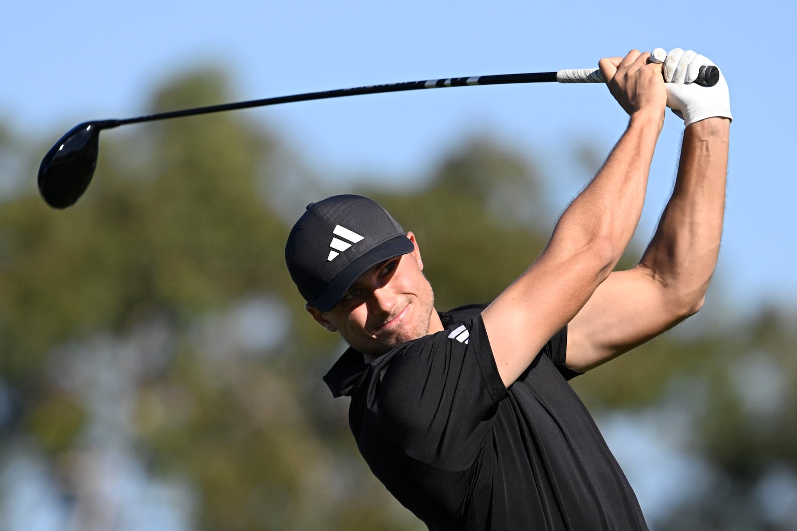 Ludvig Aberg hits his tee shot on the second hole on the South Course at Torrey Pines during the second round of the Farmers Insurance Open golf tournament Thursday, Jan. 23, 2025, in San Diego. (AP Photo/Denis Poroy)