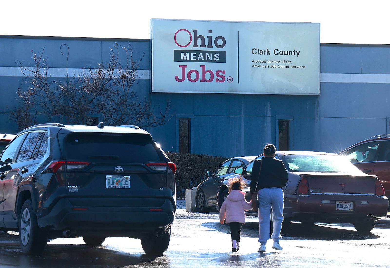 People enter the Clark County Department of Job and Family Services Thursday, Dec. 12, 2024. BILL LACKEY/STAFF