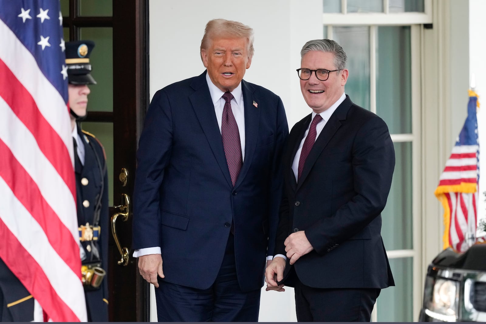 Britain's Prime Minister Keir Starmer is greeted by President Donald Trump as he arrives at the White House in Washington, Thursday, Feb. 27, 2025. (AP Photo/Ben Curtis)