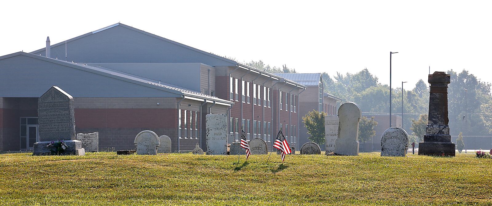 Flick Cemetery on the Northwestern School District campus Friday, August 4, 2023. BILL LACKEY/STAFF