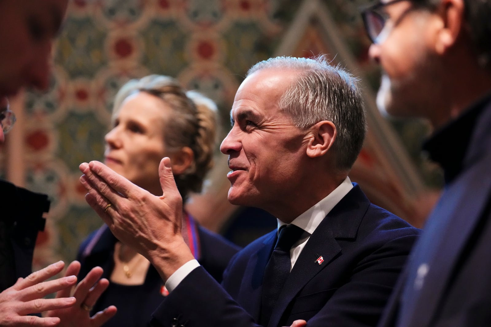 Canada's Prime Minister Mark Carney and wife Diana Fox Carney tour Notre-Dame Cathedral in Paris, Monday, March 17, 2025. (Sean Kilpatrick/The Canadian Press via AP)