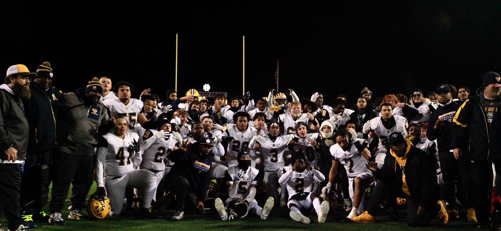 Springfield poses for a team photo after a victory against Marysville in a Division I regional final on Nov. 19, 2021, at Hilliard Darby High School. David Jablonski/Staff