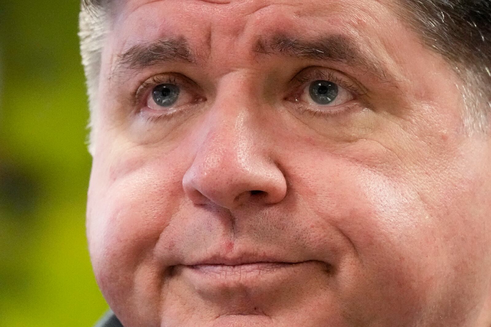 Illinois Gov. JB Pritzker visits the Soybean Innovation Lab at the University of Illinois, which is impacted by DOGE funding cuts, in Urbana, Ill., Wednesday, March 19, 2025. (AP Photo/Nam Y. Huh)