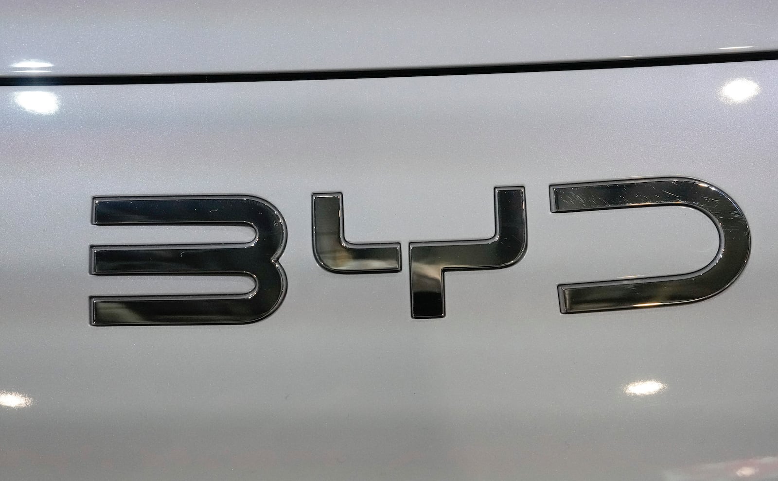 FILE - The BYD logo is photographed at the Paris Auto Show in Paris, Oct. 15, 2024. (AP Photo/Michel Euler, File)