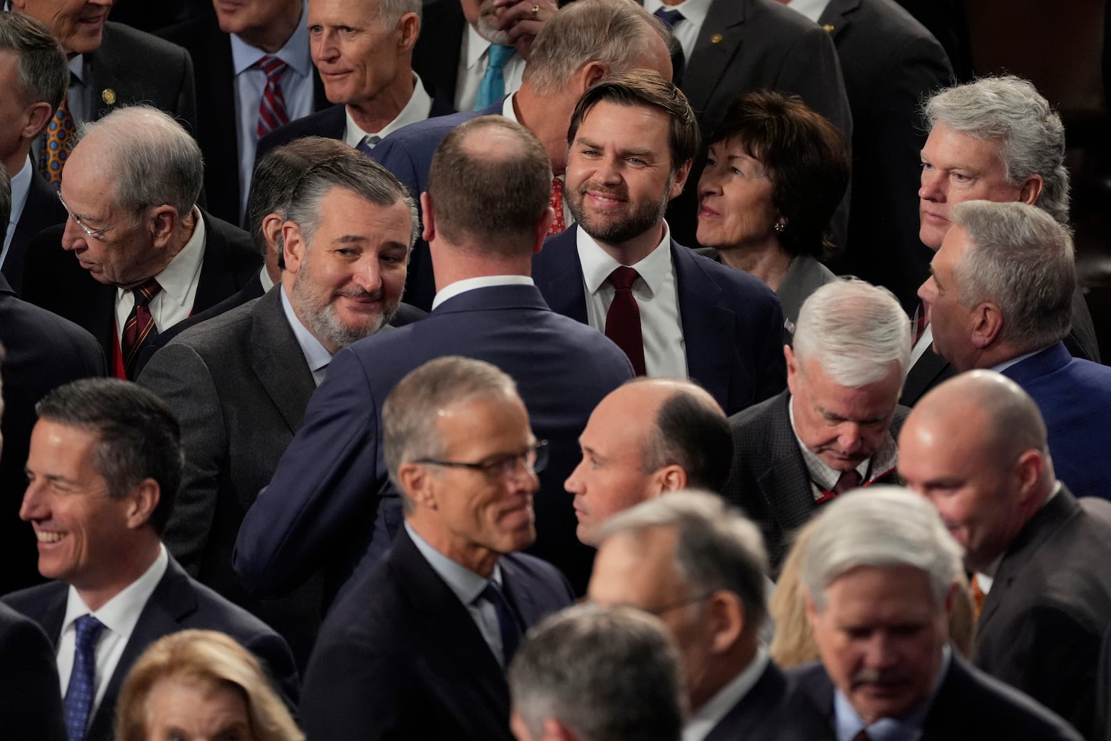 Republicans congratulate Vice President-elect JD Vance after a joint session of Congress convened to confirm the Electoral College votes, affirming President-elect Donald Trump's victory in the presidential election, Monday, Jan. 6, 2025, at the U.S. Capitol in Washington. (AP Photo/Manuel Balce Ceneta)