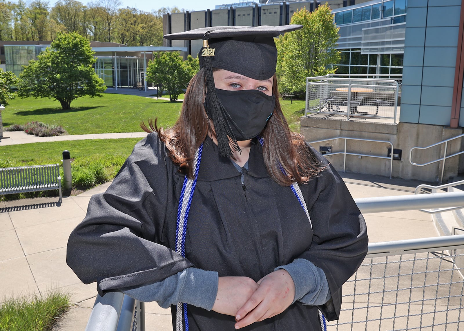 Lanna Kunzelman, 14, graduated from Clark State College this year. Lanna, who's still in high school, plans to major in biology at Wright State and wants to be a neurosurgeon. BILL LACKEY/STAFF