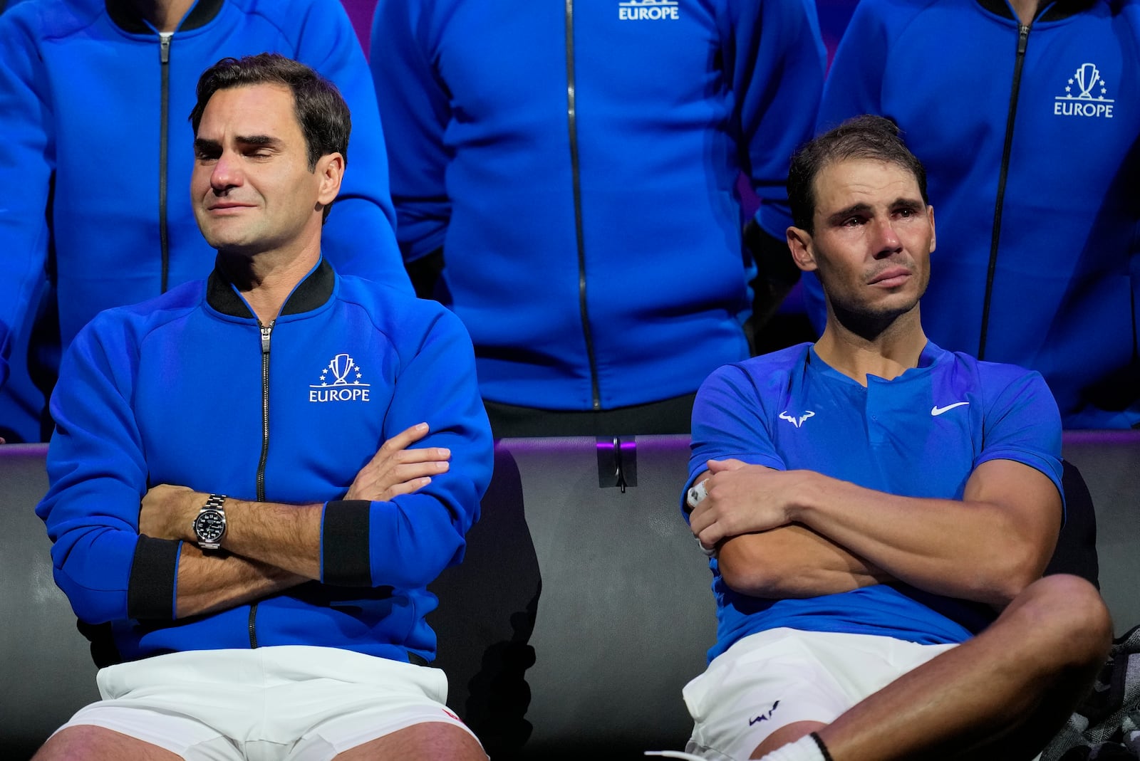 FILE - An emotional Roger Federer, left, of Team Europe sits alongside his playing partner Rafael Nadal after their Laver Cup doubles match against Team World's Jack Sock and Frances Tiafoe at the O2 arena in London, Friday, Sept. 23, 2022. (AP Photo/Kin Cheung, File)