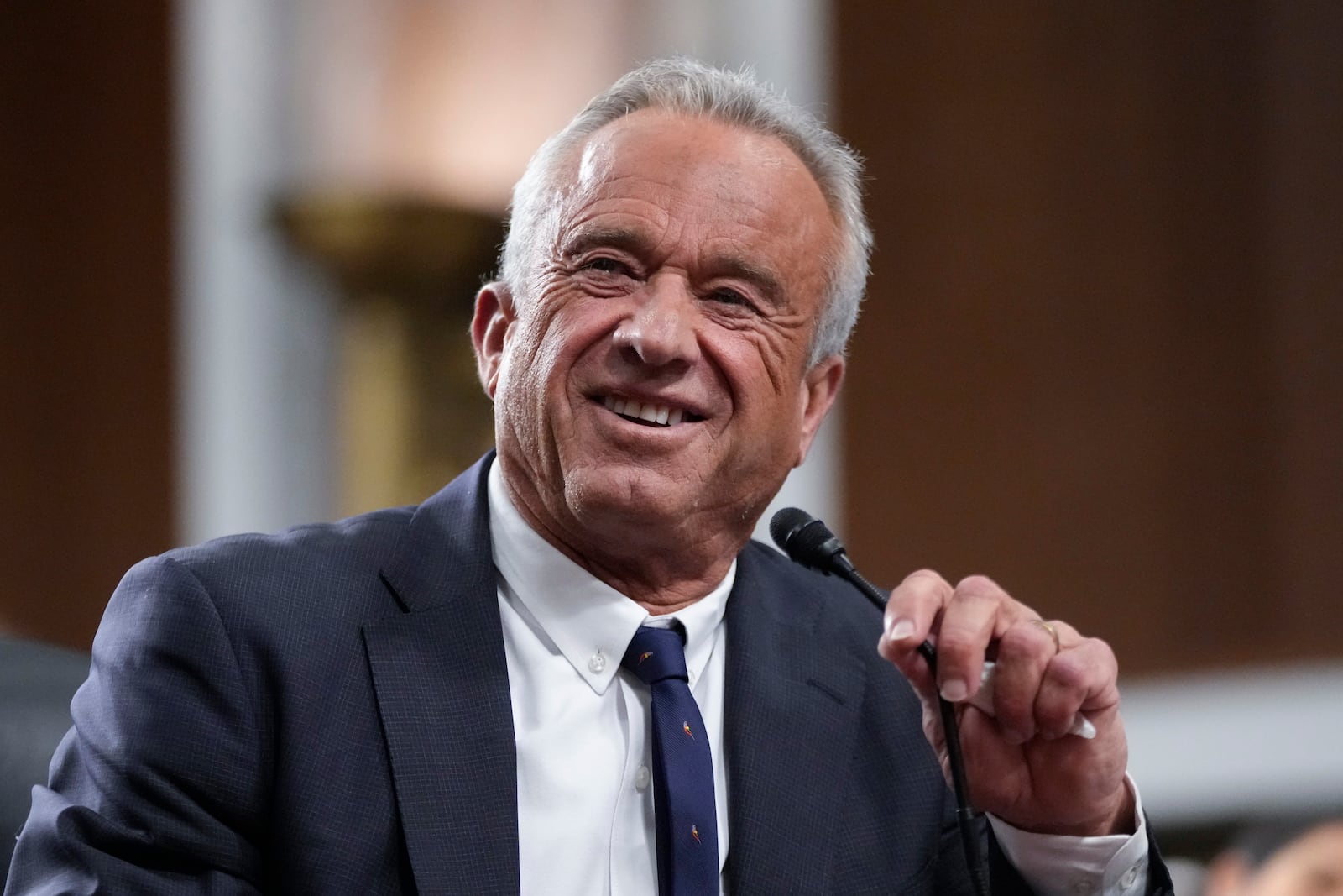 Robert F. Kennedy Jr., President Donald Trump's choice to be Secretary of Health and Human Services, appears before the Senate Finance Committee for his confirmation hearing, at the Capitol in Washington, Wednesday, Jan. 29, 2025. (AP Photo/Ben Curtis)