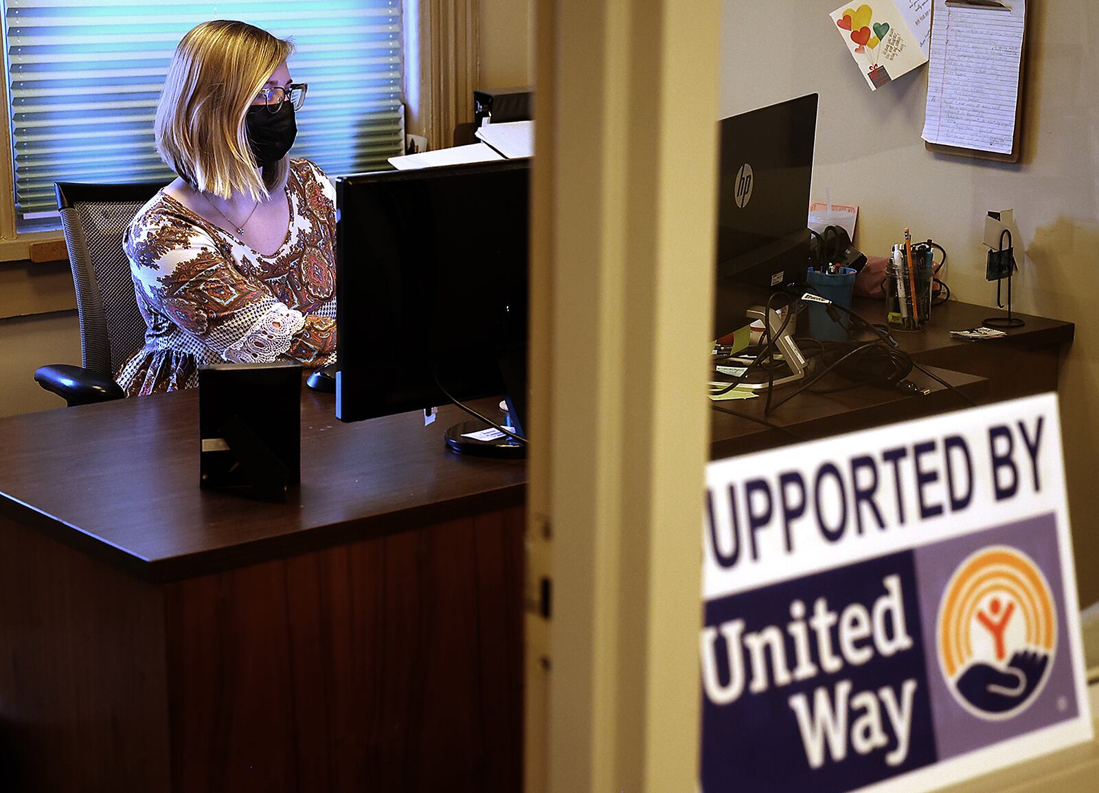 Kara Van Zant works in her office at the United Way office in Springfield. BILL LACKEY/STAFF