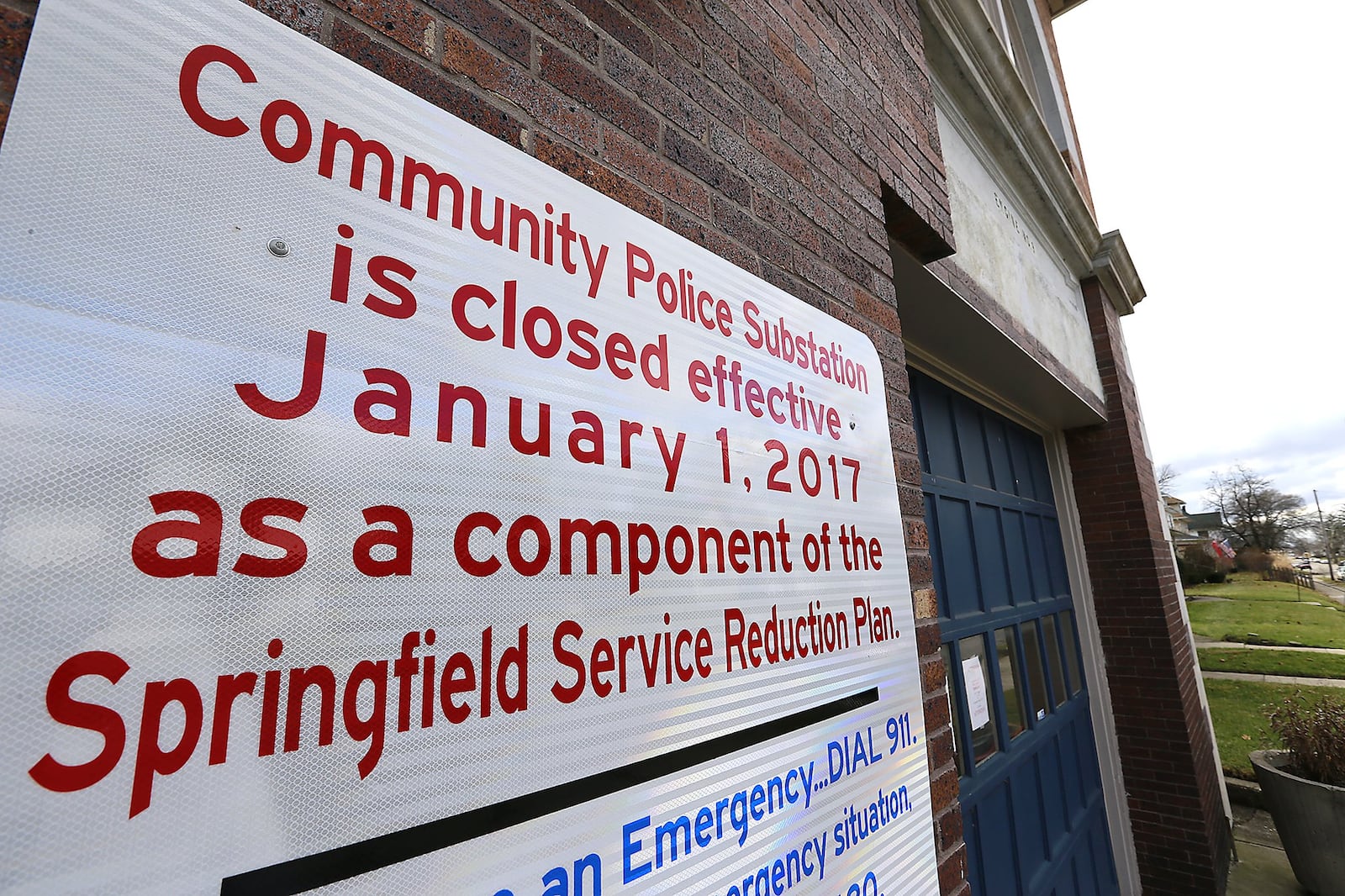 A large sign on the front of the Springfield police substation at 17 W. Johnny Lytle Ave. says the station was closed January 1, 2017 due to the Springfield Service Reduction Plan. Bill Lackey/Staff