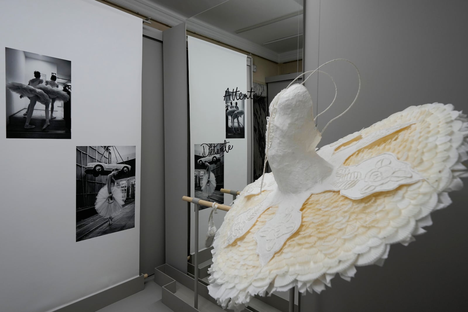 Pictures are displayed during the unveiling of the photo exhibition 'Lo sguardo nascosto' ( The hidden gaze) by photographer Gerard Uferas, at the La Scala Opera House in Milan, Italy, Tuesday, Feb. 11, 2025. (AP Photo/Luca Bruno)