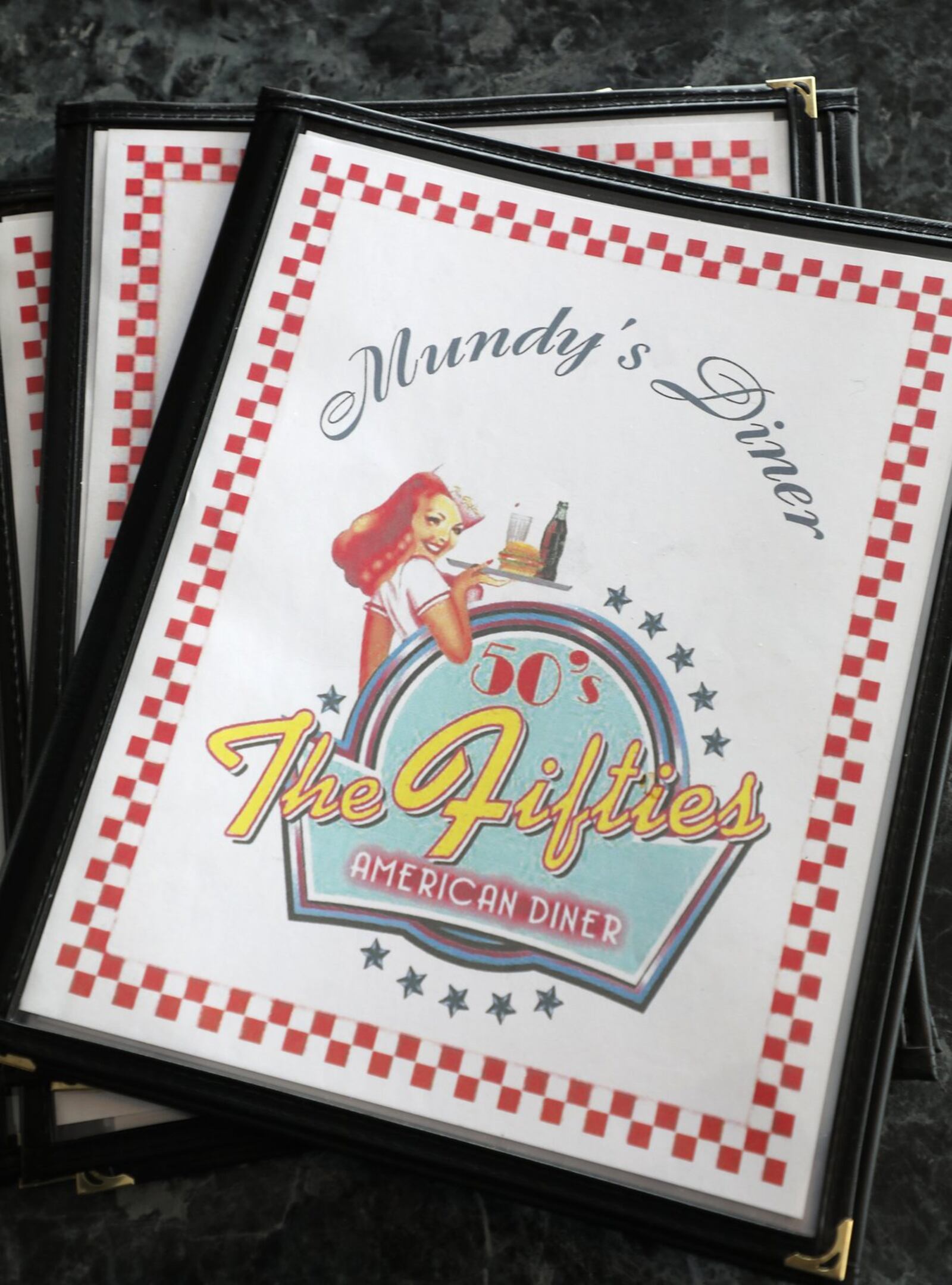 The menu at Mundy's Diner. Bill Lackey/Staff