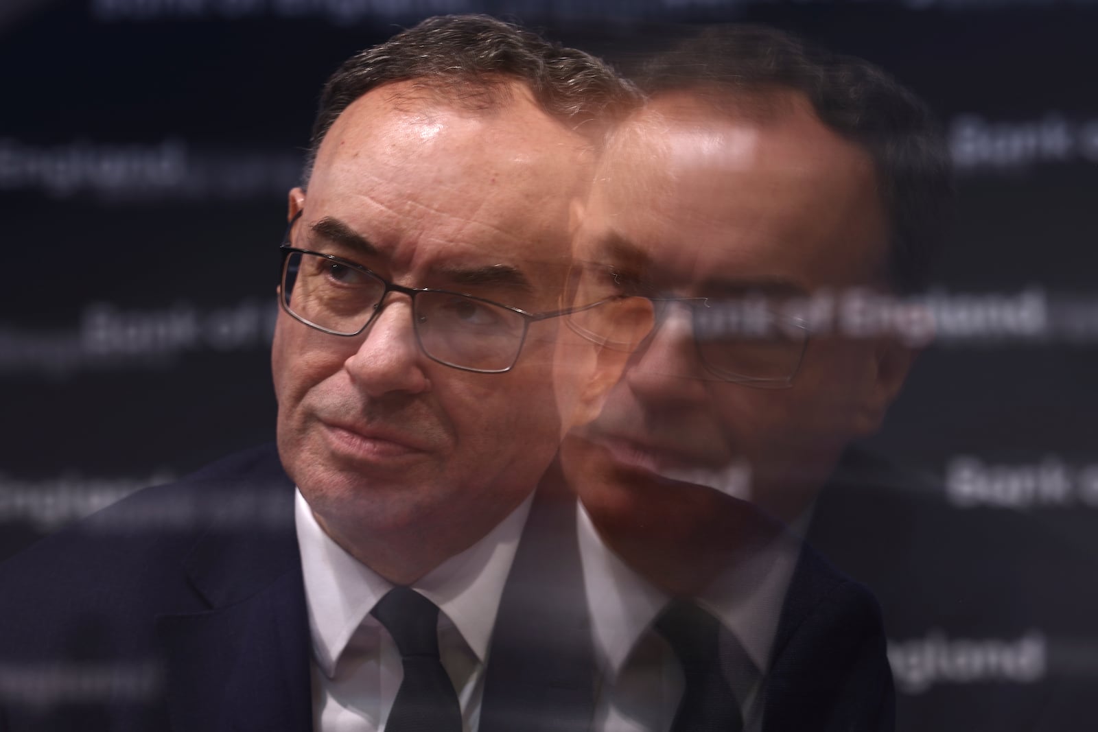 Bank of England Governor Andrew Bailey attends the central bank's Monetary Policy Report press conference at the Bank of England, in London, Thursday, Nov. 7, 2024. (Henry Nicholls/Pool Photo via AP)