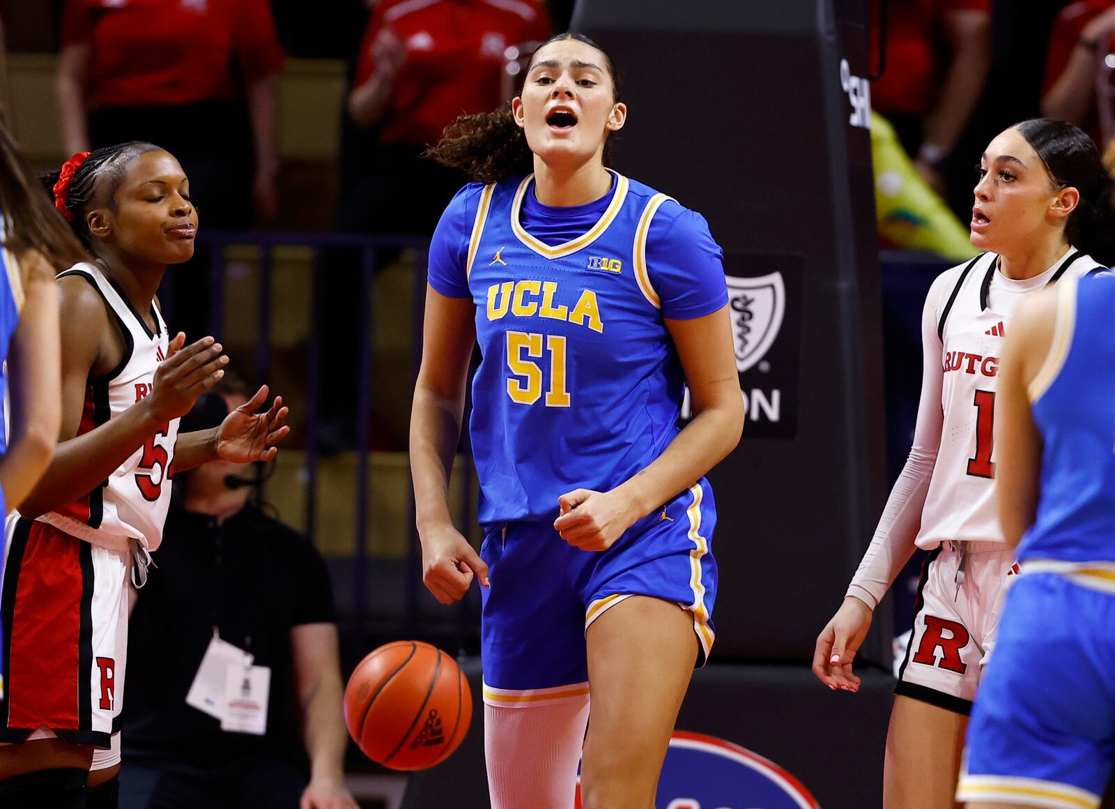 UCLA center Lauren Betts (51) reacts after scoring against Rutgers during the second half of an NCAA college basketball game, Thursday, Jan. 23, 2025, in Piscataway, N.J. (AP Photo/Noah K. Murray)