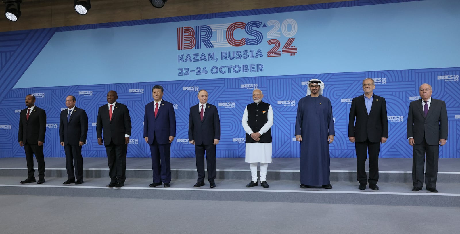 From left: Ethiopian Prime Minister Abiy Ahmed, Egyptian President Abdel Fattah el-Sisi, South African President Cyril Ramaphosa, Chinese President Xi Jinping, Russian President Vladimir Putin, Indian Prime Minister Narendra Modi, United Arab Emirates President Sheikh Mohammed bin Zayed Al Nahyan, Iranian President Masoud Pezeshkian and Brazilian Foreign Minister Mauro Vieira pose for a family photo prior to the BRICS Summit plenary session in Kazan, Russia, Wednesday, Oct. 23, 2024. (Maxim Shipenkov, Pool Photo via AP)