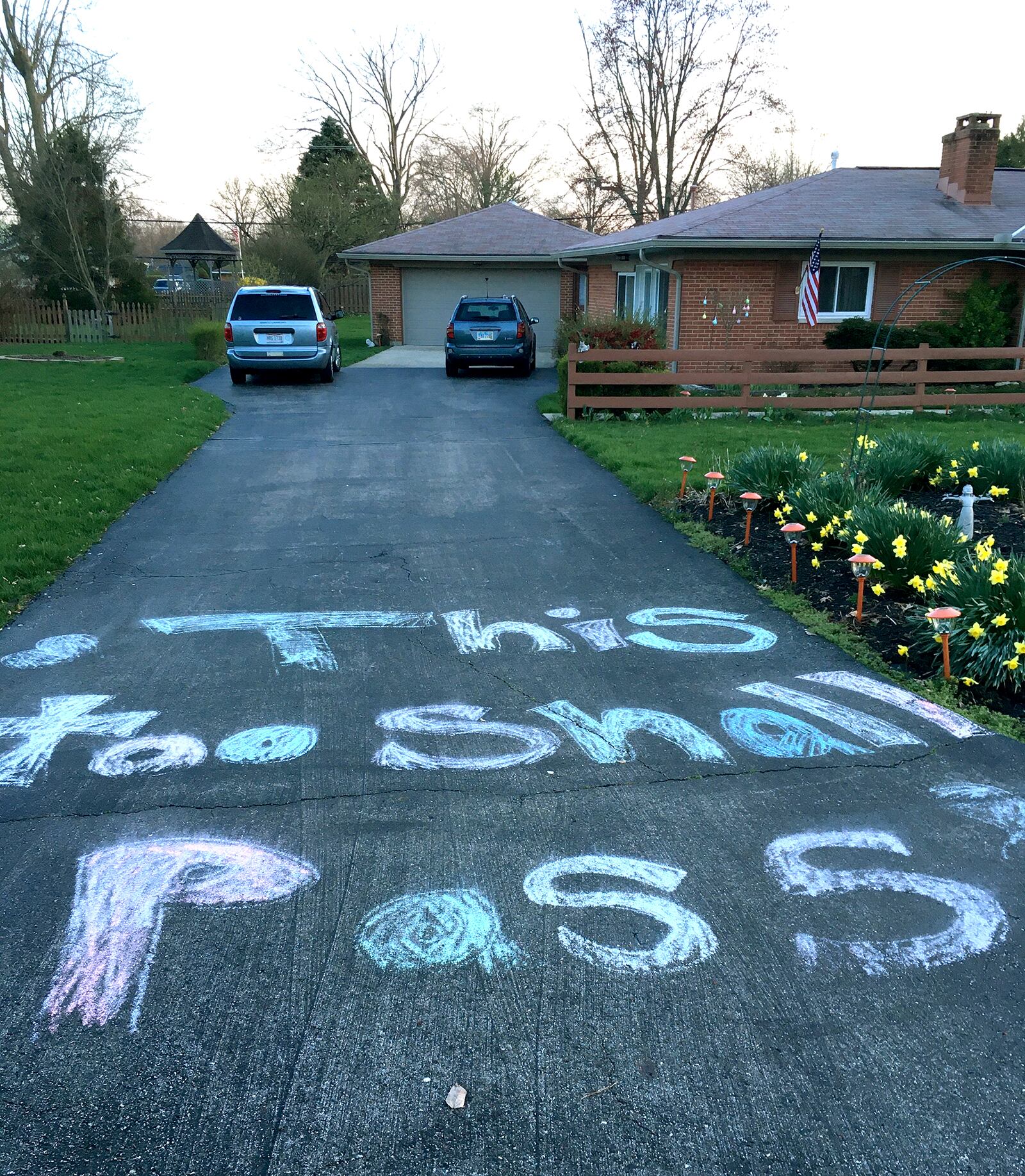 A message on a Washington Twp. driveway for neighbors to keep their spirits up during the coronavirus quarantine. JIM BEBBINGTON / STAFF