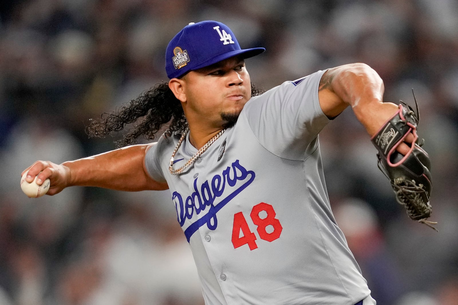 Los Angeles Dodgers pitcher Brusdar Graterol throws against the New York Yankees during the sixth inning in Game 5 of the baseball World Series, Wednesday, Oct. 30, 2024, in New York. (AP Photo/Ashley Landis)