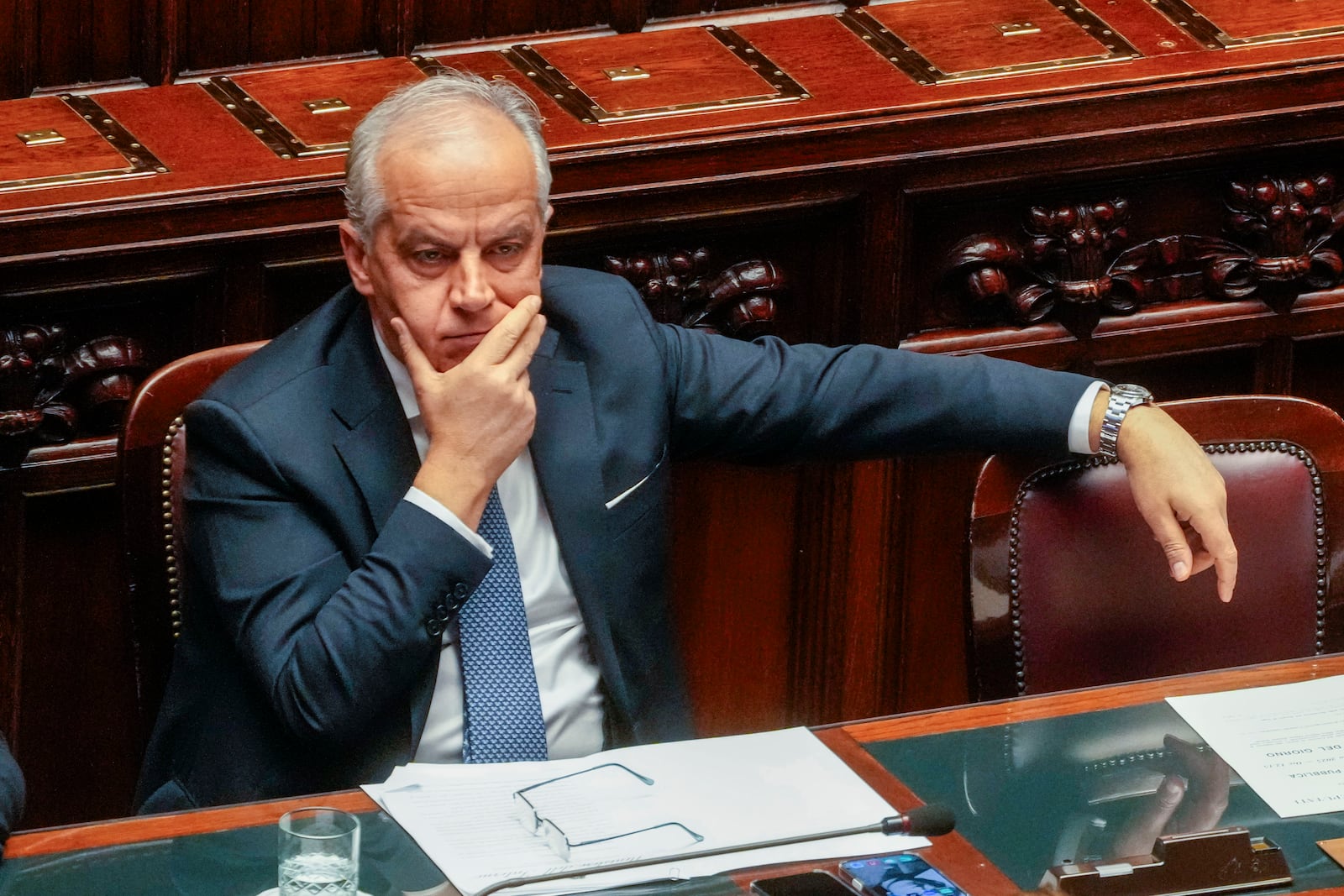 Italian Interior Minister Matteo Piantedosi attends a debate in the lower Chamber in Rome, Wednesday, Feb. 5, 2025, after receiving a warrant for repatriating a Libyan warlord, Ossama Anjiem, also known as Ossama al-Masri, wanted by the International Criminal Court in the Hague and who had been arrested in Turin, Northern Italy. (AP Photo/Gregorio Borgia)