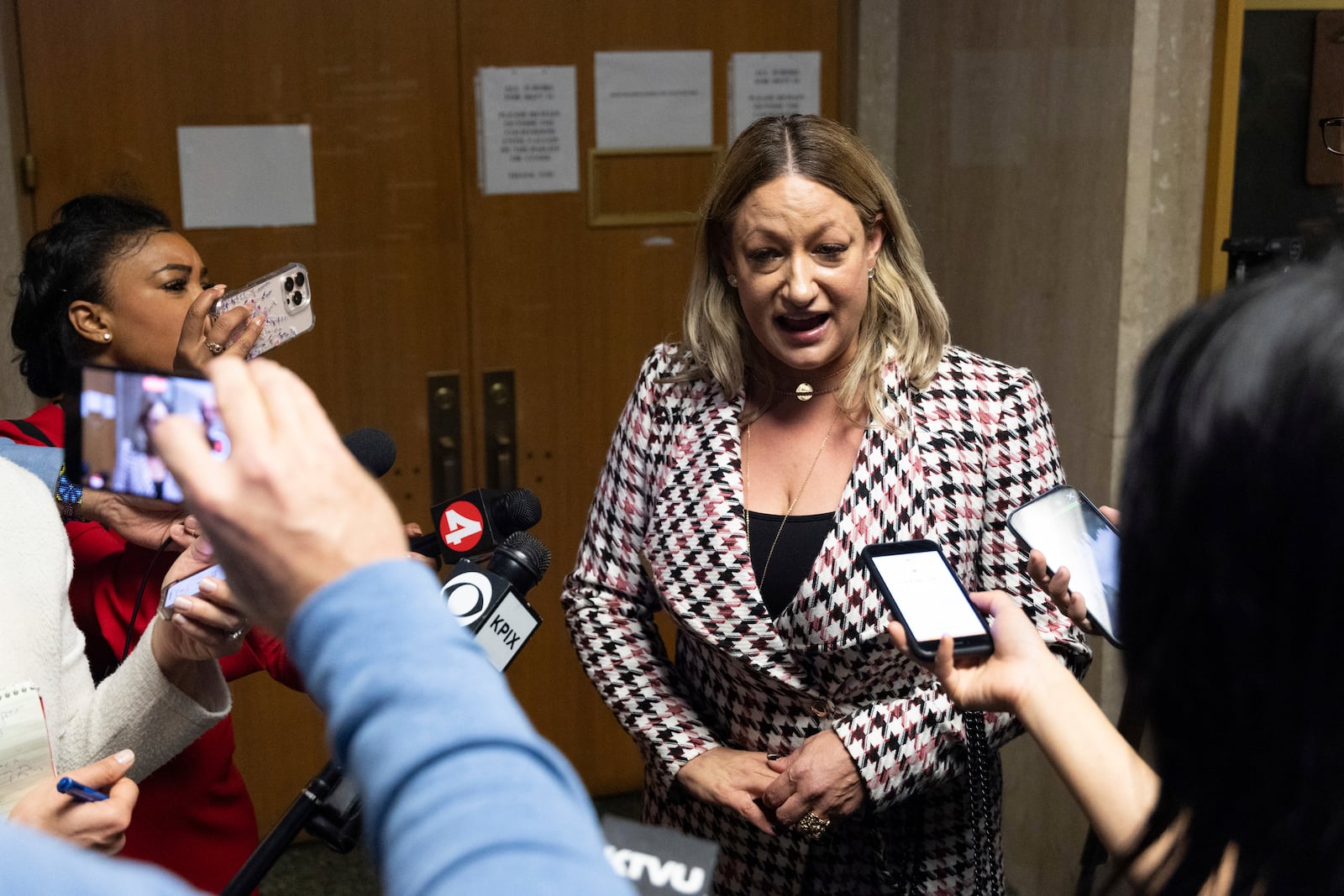 Bob Lee's ex wife, Krista Lee, makes remarks at the Hall of Justice during the murder trial of Nima Momeni Tuesday, Dec. 17, 2024, in San Francisco. (AP Photo/Benjamin Fanjoy)