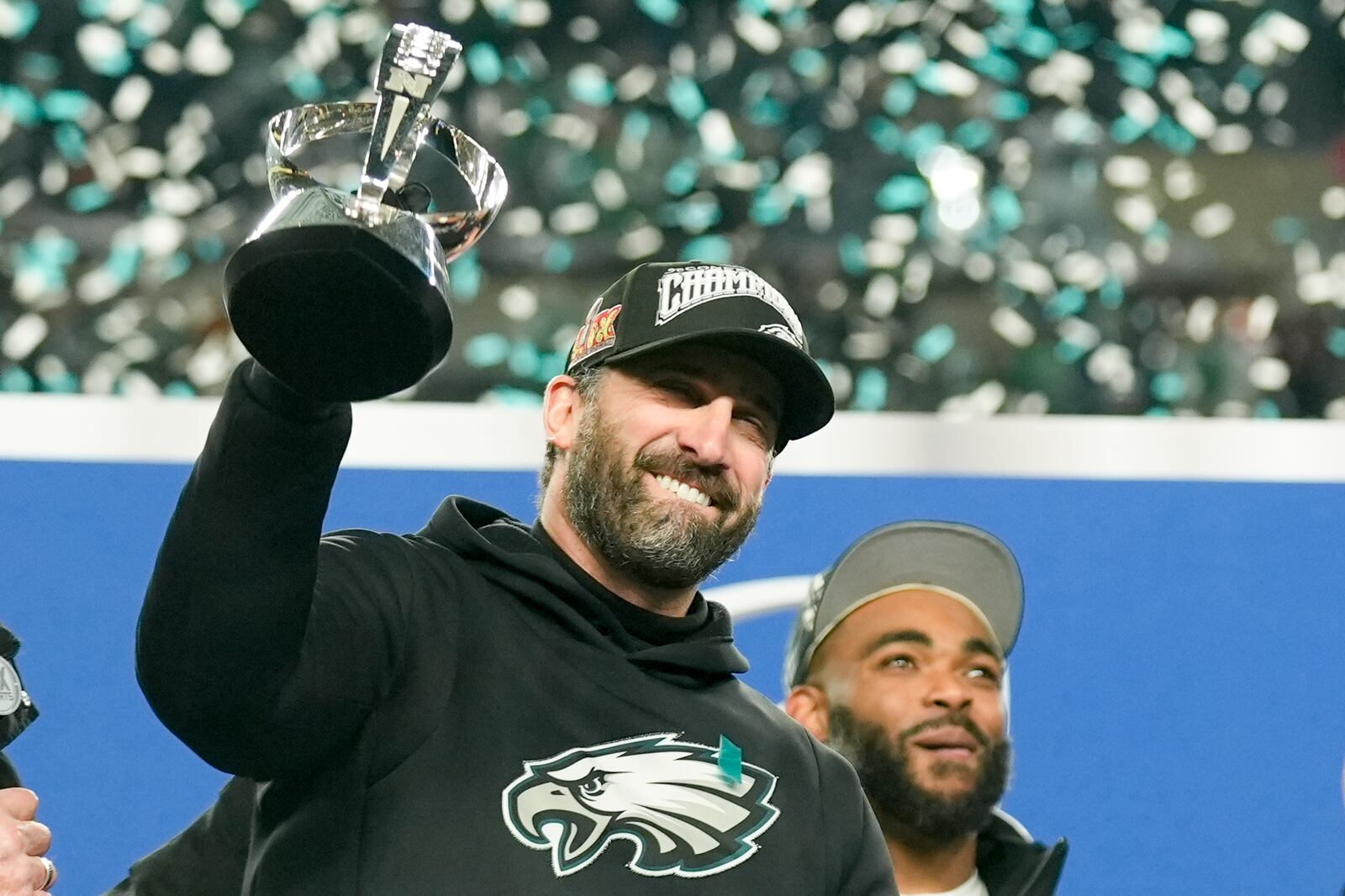 Philadelphia Eagles head coach Nick Sirianni celebrates with the trophy after their win against the Washington Commanders in the NFC Championship NFL football game, Sunday, Jan. 26, 2025, in Philadelphia. (AP Photo/Seth Wenig)