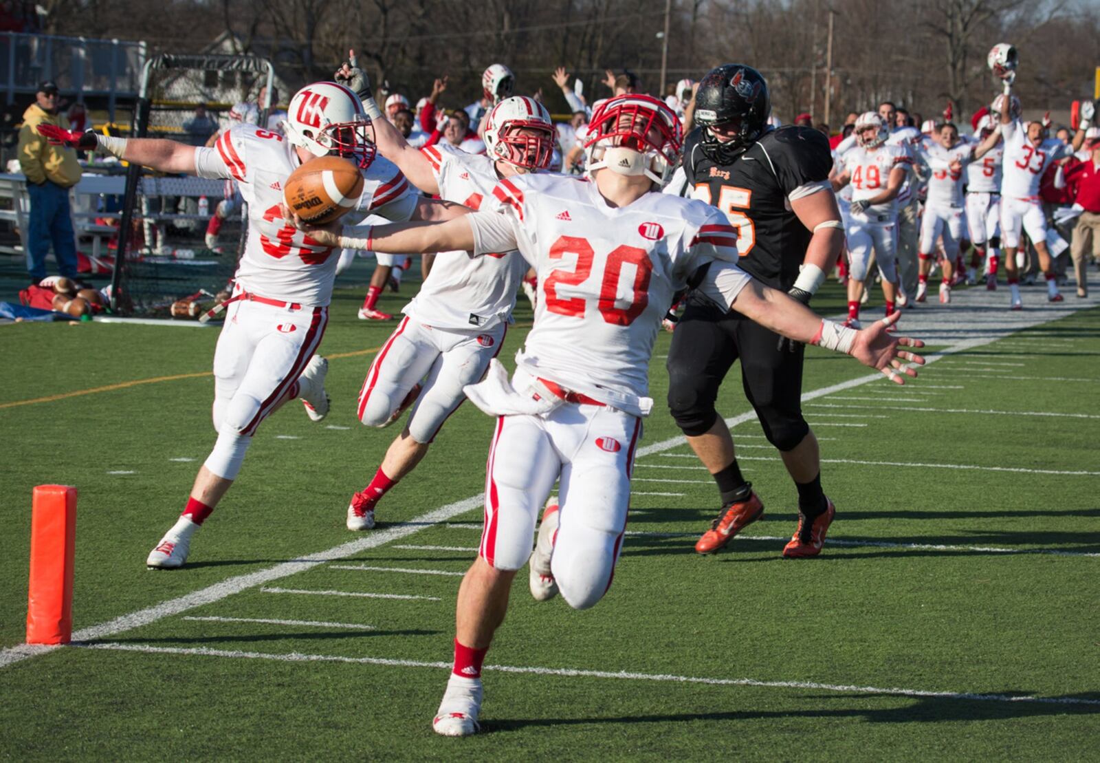 Wittenberg safety Heath Eby seals a 52-38 victory over Heidelberg with an interception returned for a touchdown Saturday in the final minute in the first round of the NCAA Division III playoffs in Tiffin. Contributed photo by David Pence