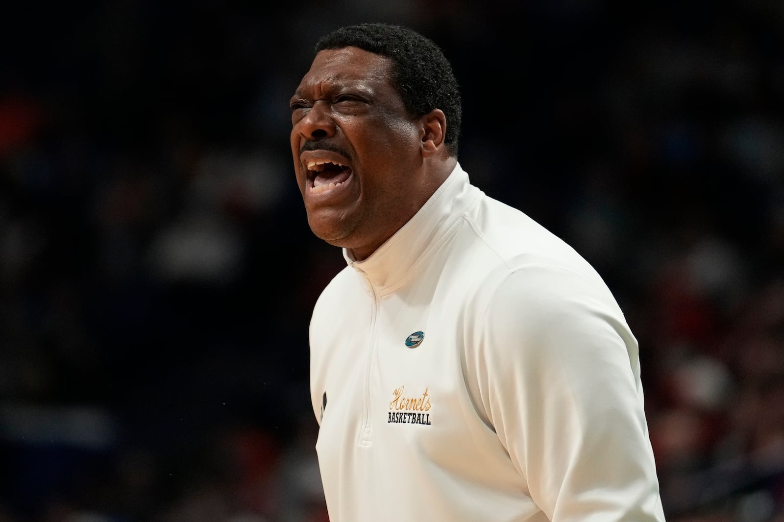 Alabama State head coach Tony Madlock reacts to play against Auburn during the first half in the first round of the NCAA college basketball tournament, Thursday, March 20, 2025, in Lexington, Ky. (AP Photo/Brynn Anderson)