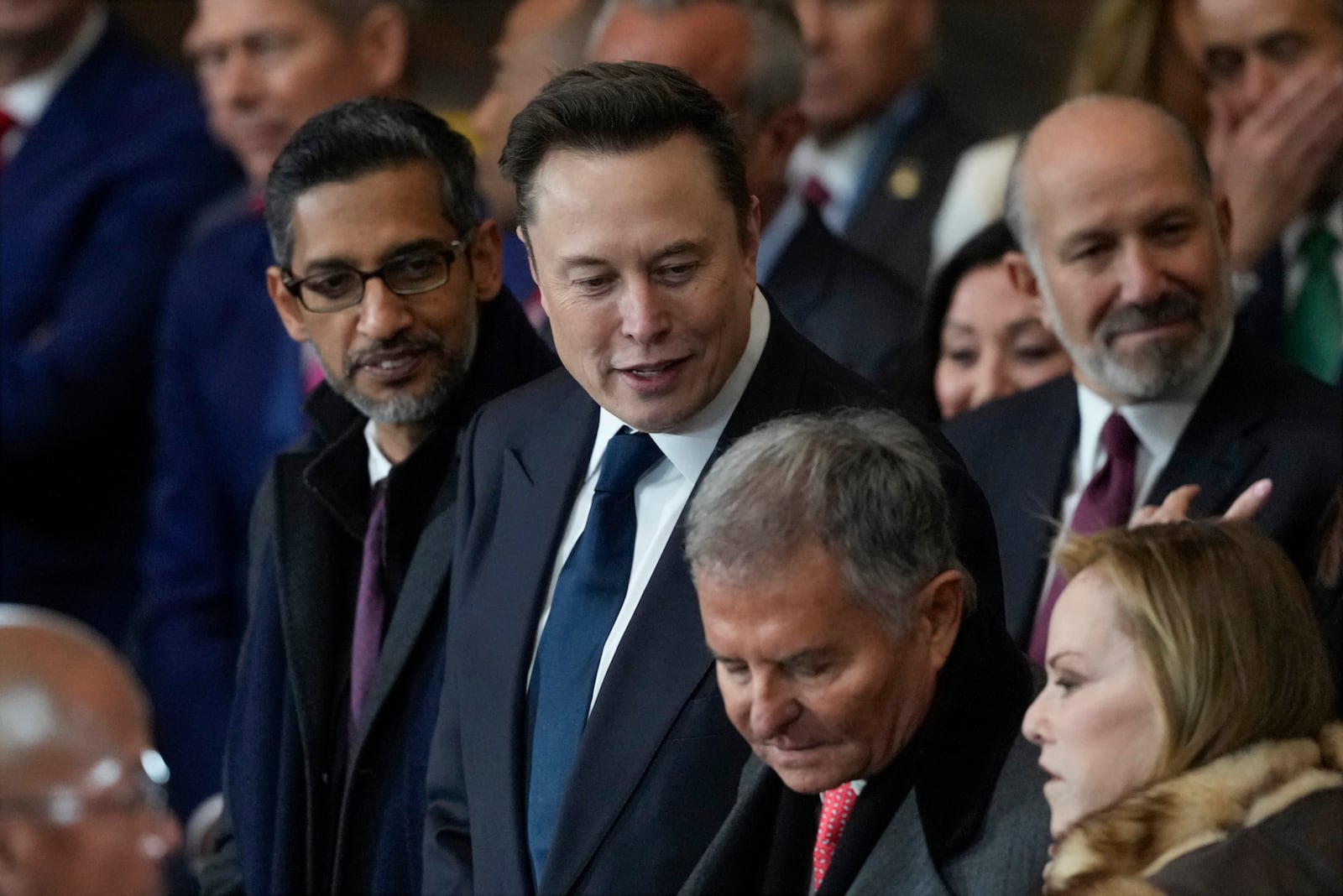 Google CEO Sundar Pichai and Elon Musk arrive before the 60th Presidential Inauguration in the Rotunda of the U.S. Capitol in Washington, Monday, Jan. 20, 2025. (AP Photo/Julia Demaree Nikhinson, Pool)