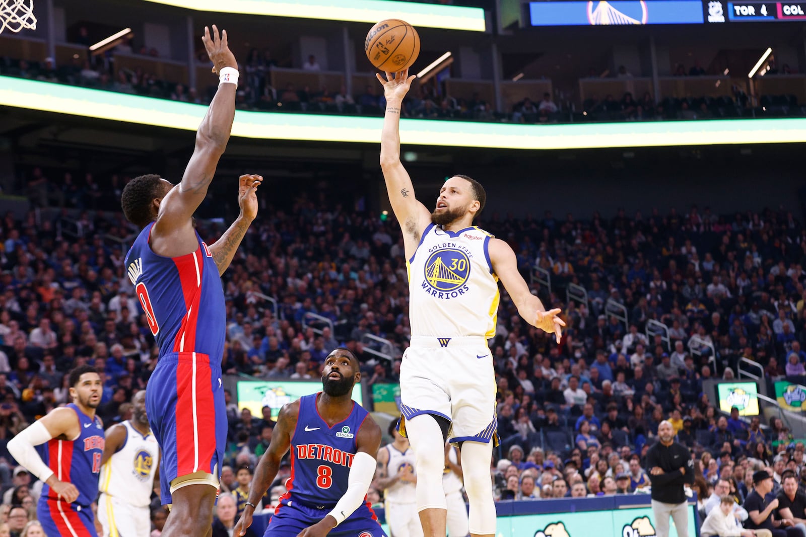 Golden State Warriors guard Stephen Curry (30) is fouled as he attempts a two pointer against the Detroit Pistons in the first quarter of an NBA basketball game in San Francisco, Saturday, March 8, 2025. (Santiago Mejia/San Francisco Chronicle via AP)