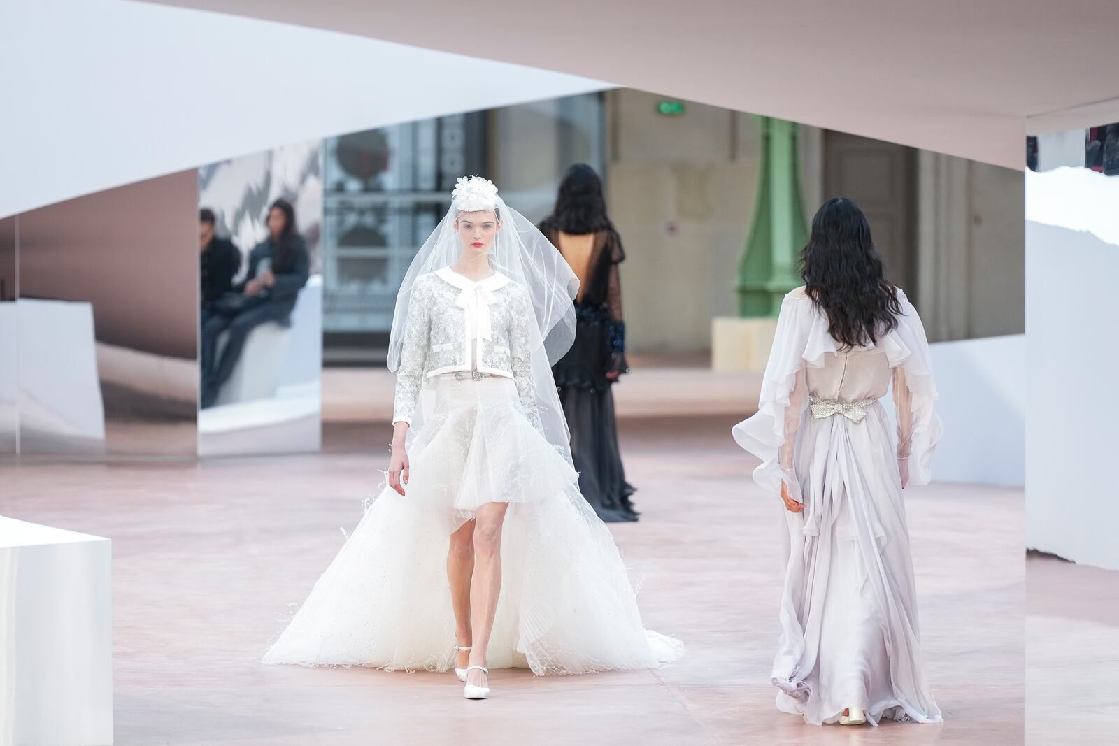 A model wears a creation as part of the Chanel Haute Couture Spring Summer 2025 collection, that was presented in Paris, Tuesday, Jan. 28, 2025. (AP Photo/Lewis Joly).