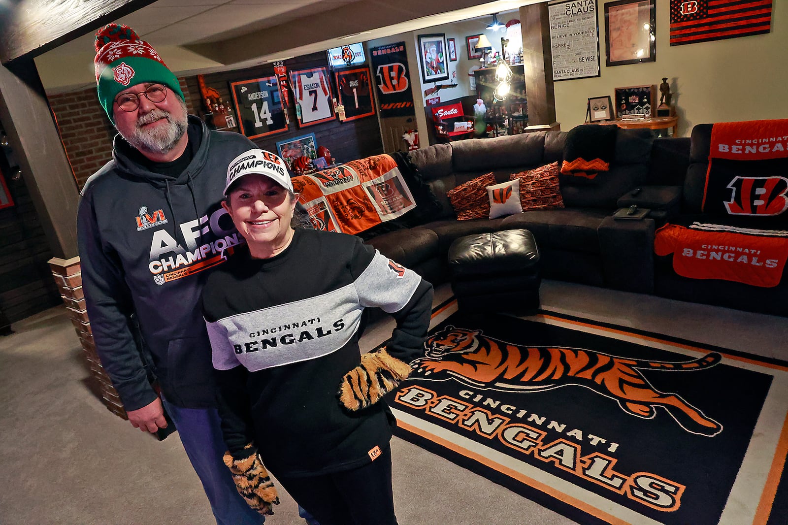 Longtime Bengals fans John and Susan Fleeger will be on hand to watch the Bengals take on the Ravens Sunday. BILL LACKEY/STAFF