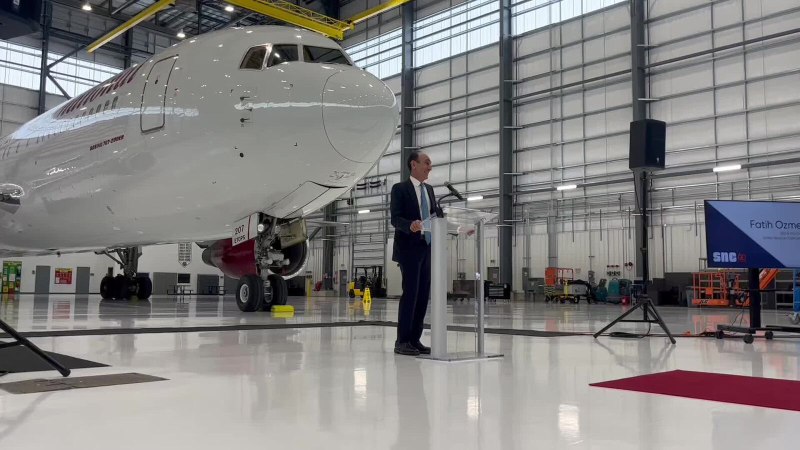 Fatih Ozmen, CEO and co-owner of Sierra Nevada Corp., speaks at a ribbon-cutting event for a new maintenance, repair and overhaul facility at the Dayton International Airport on Wednesday, Feb. 8, 2023. CORNELIUS FROLIK / STAFF