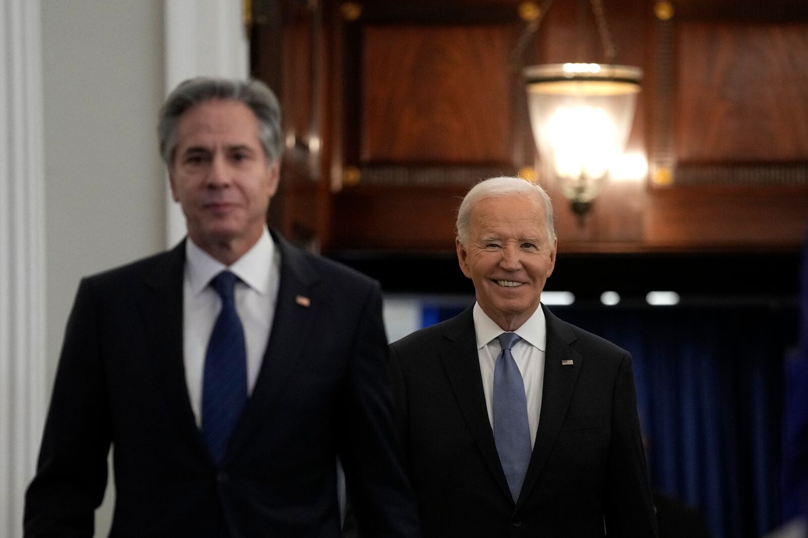 President Joe Biden, left, walks with Secretary of State Antony Blinken, left, as he arrives to give a speech about foreign policy at the State Department in Washington, Monday, Jan. 13, 2025. (AP Photo/Susan Walsh)