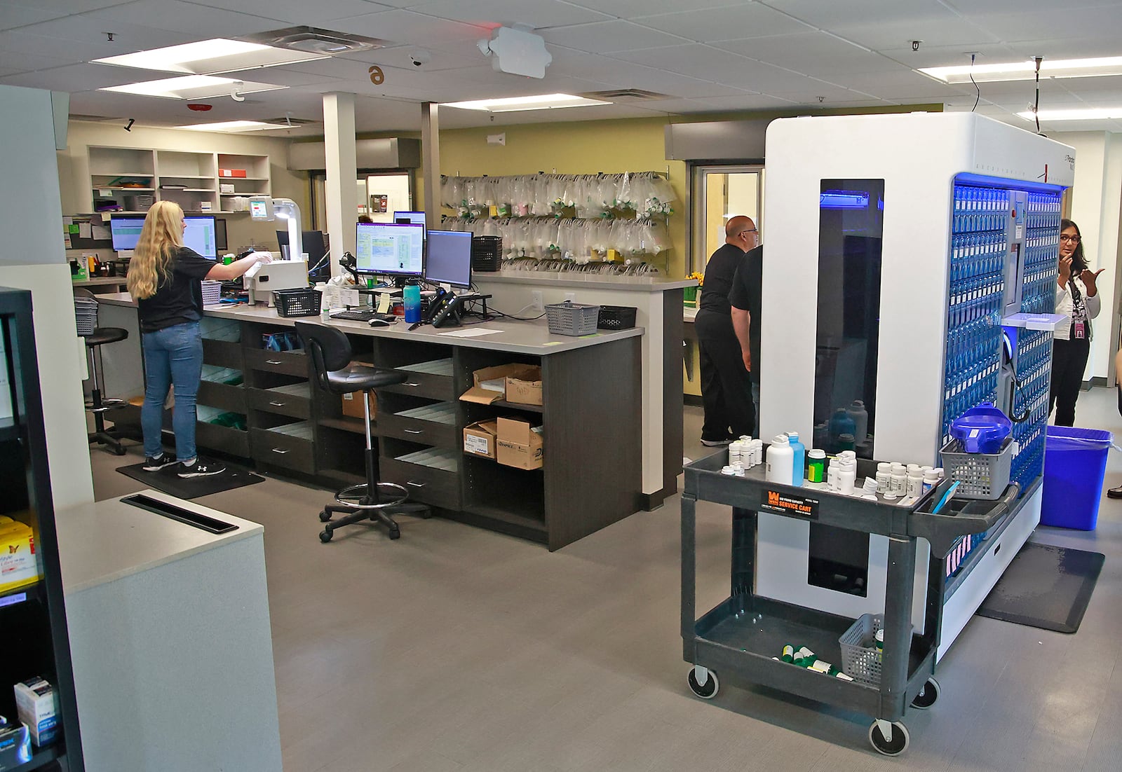 The Rocking Horse Center held an open house Wednesday, August 7, 2024 showcasing their newly expanded in-house pharmacy which doubled in size and added a second pick-up and service window. The pharmacy also added a new Parata drug dispensing machine. BILL LACKEY/STAFF