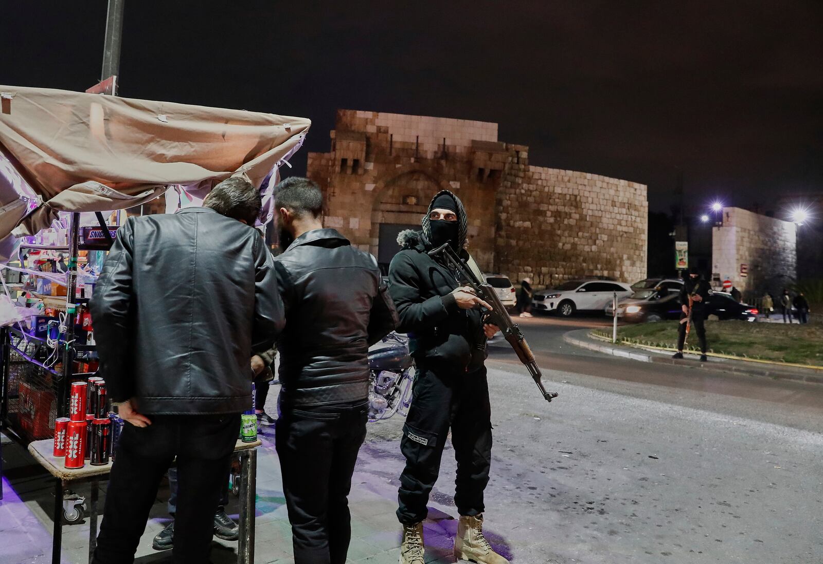 Members of the Syrian government security forces deploy at a street in Damascus, Syria, Thursday, March 6, 2025. (AP Photo/Omar Sanadiki)