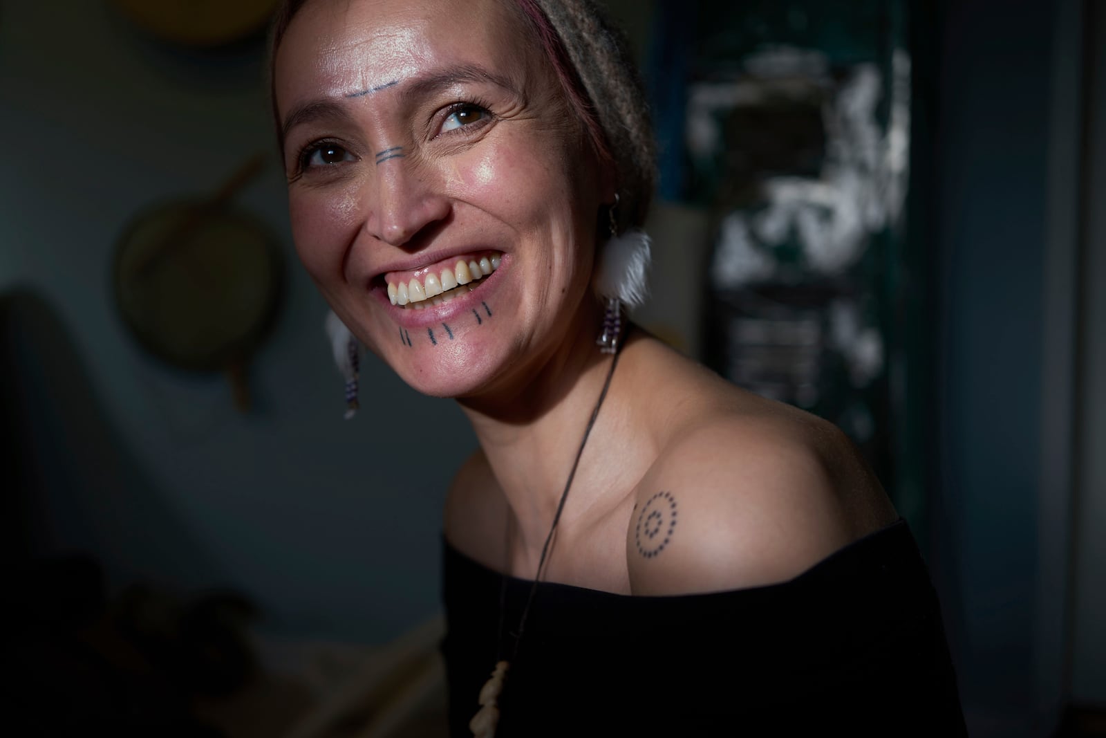 Aviaja Rakel Sanimuinaq, an angakkoq or shaman, poses for a portrait where she performs soul healing in Nuuk, Greenland, on Wednesday, Feb. 19, 2025. (AP Photo/Luis Andres Henao)